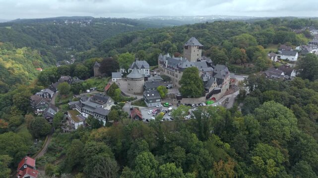 Castle Burg at Solingen region with a drone fly over during Autumn time window