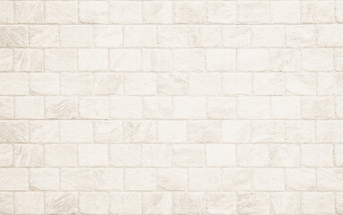 Kitchen wallpaper concept: Close up modern beige brick tiles wall texture background, White brick wall texture background for stone tile block in grey light color wallpaper modern interior.