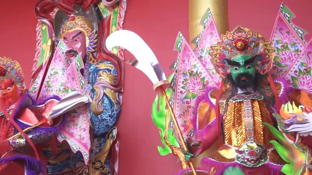 Chinese Ghost Festival people use colourful paper gods to sacrifice.