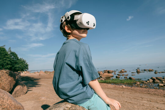 Atmospheric photo of child wearing virtual glasses