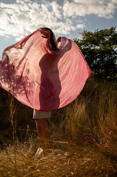 African American woman in the sun in nature