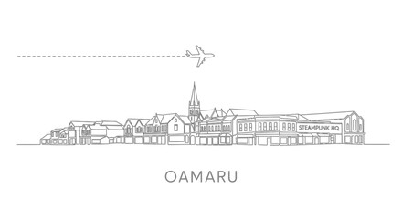 Obraz premium Oamaru New Zealand skyline with plane flying over town, and travel concept.