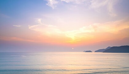 Fototapeta premium Soft dawn sea haze masking horizon upper frame wallpaper background representing atmospheric seascape suitable for calm natural design