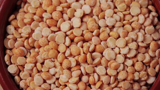 Dried yellow peas close up. Round yellow peas for cooking porridge. Healthy food concept. Healthy nutrition, vegan food. High quality 4k footage