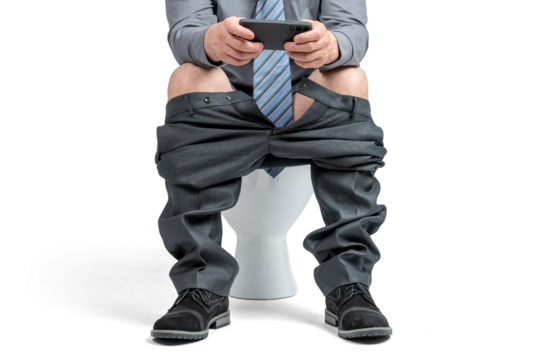 Businessman in suit and tie sits on toilet, pants at ankles, holding smartphone. Humorous office moment on transparent background, png. Face not shown. - Powered by Adobe