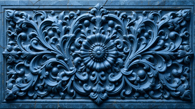 Intricate blue stone carving with swirling patterns and ornate details, showcasing masterful craftsmanship.