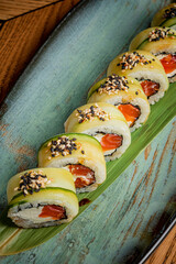 Colorful sushi rolls arranged neatly on a beautiful platter, perfect for sharing and enjoying