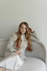 Happy positive elegant woman. Close up portrait of blondie long-haired caucasian woman
