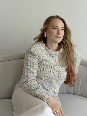 Happy positive elegant woman. Close up portrait of blondie long-haired caucasian woman