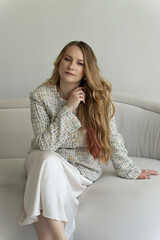 Happy positive elegant woman. Close up portrait of blondie long-haired caucasian woman