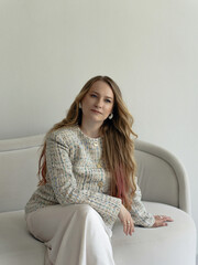Happy positive elegant woman. Close up portrait of blondie long-haired caucasian woman