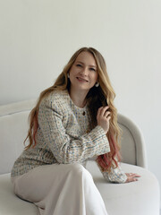 Happy positive elegant woman. Close up portrait of blondie long-haired caucasian woman