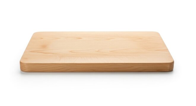 A rectangular, light-colored, wooden cutting surface with rounded corners sits isolated against a white background, casting a subtle shadow