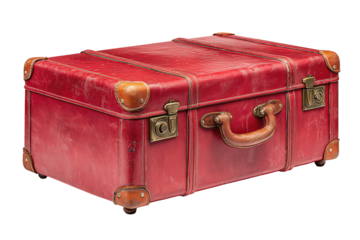 Vintage red leather suitcase, corner-reinforced with burnished brass feet, top handle folded, 3/4 left; isolated on transparent white background, no shadow or reflection, no text.