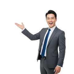 Smiling asian businessman in a suit presenting with open hand gesture in a professional setting transparent background