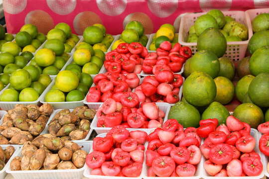 Fruit like Pommerak, zesty limes, sweet maripa, and the juicy rose apple on a market in Suirname