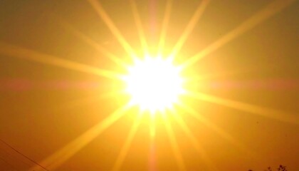 Obraz premium Bright sunburst at sunset