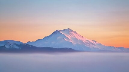 Panoramic view of volcanic range at sunrise with lenticular clouds forming over peaks