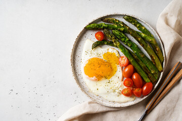Fried Egg with Asparagus and Cherry Tomatoes