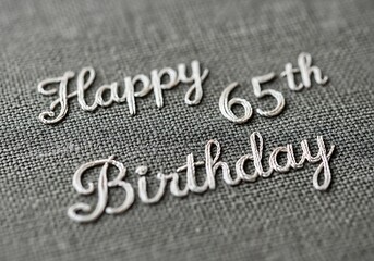 Fototapeta premium 65th birthday text design embroidered on fabric