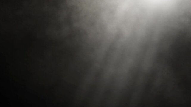 Light beams and smoke effect, seamless video looping, dynamic black and white sunbeam and mist overlay