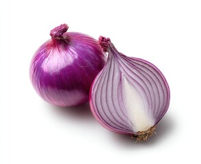 Two red onions, one whole and one halved, laying on a white surface casting a soft shadow