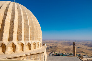 Dome of Zinciriye Madrasa and Mesopotamia view with Great Mosque of Mardin
