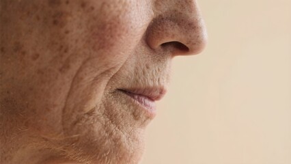 Fototapeta premium Close-up of a Senior Person's Natural Face with Age Spots and Blemishes