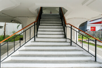 Modern Concrete Staircase with Black Railings