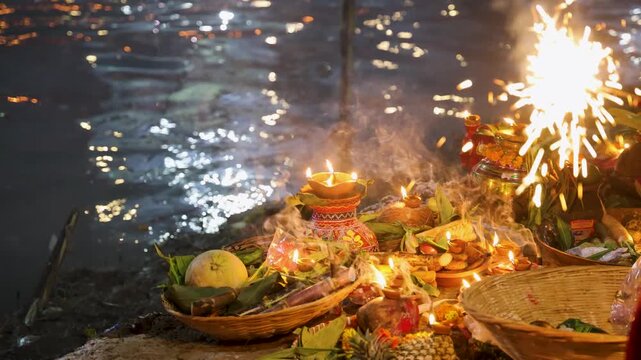 festive chhath puja celebration with offerings basket and sparkling lights at riverbank