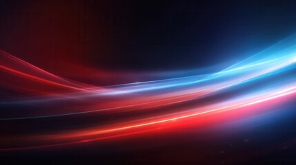 Fototapeta premium Abstract light trails in red and blue colors create a dynamic and vibrant background. The scene conveys a sense of motion and energy.