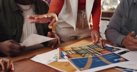 Above, hands and people with documents, graphic design and project management with inspiration. Brainstorming, creative agency and employees in office, paperwork and marketing proposal with planning