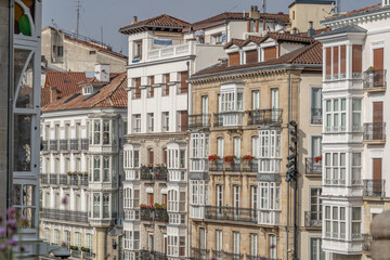 Fototapeta premium Ornate Balconies and Architectural Details on Old Buildings in Vitoria-Gasteiz, Spain. European Cityscape, Historic Architecture, Bay Windows