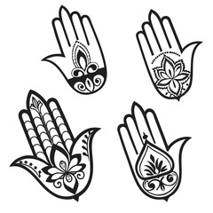 Fototapeta premium Four black hand ornaments with floral patterns mehndi