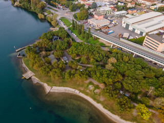 Aerial landscape of Lecco Maggianico and Lago di Garlate Lake fall in Italian Alps Lombardy