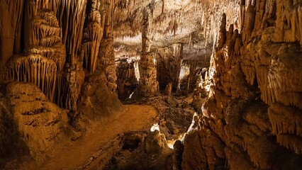 Explore the stunning caves of Mallorica, where nature reveals its beauty through unique stalactites...