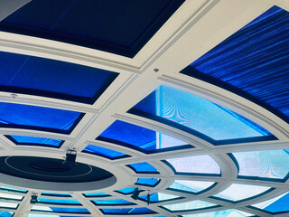 Futuristic design, concentric rings and radial segments illuminated with vibrant LED panels 