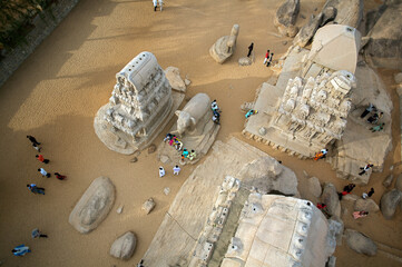 Mahabalipuram, India - 17 September 2006: Aerial view of monolithic rock-cut temples, where shadows dance across the ancient stone, revealing the intricate carvings.