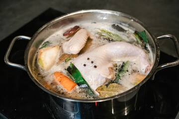 Homemade chicken soup served in a bowl