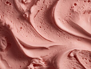 Close-up shot of pale pink ice cream swirls, showing texture and small air bubbles in the surface. Concept for dessert backgrounds, confectionary texture and frozen treat advertising