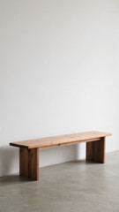 Minimal wooden bench with wide legs on concrete floor in bright white room