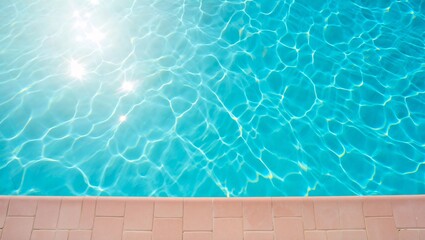 Obraz premium Sunlight shimmers on a refreshing blue swimming pool surface