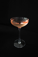 Elevated Cocktail: A meticulously composed photograph showcases a chic cocktail, perfectly framed against a stark, minimalist background. It speaks of luxury and elevates the experience.