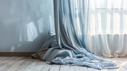 Light Blue Curtains Draped Over Floor Near Window in Bright Room