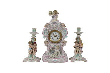 antique clock on white background  Continental Porcelain Mantel Clock