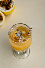 Homemade Colombian maracuyada with rustic background