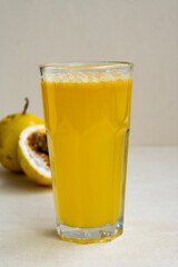 Yellow passion fruit juice closeup  Exotic tropical beverage