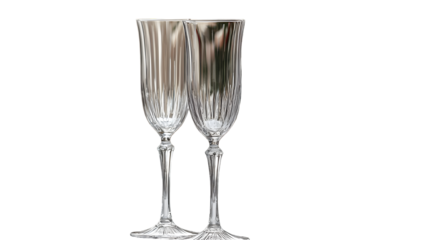 Elegant crystal champagne flutes on a formal table setting ready for a celebratory occasion isolated on a transparent background