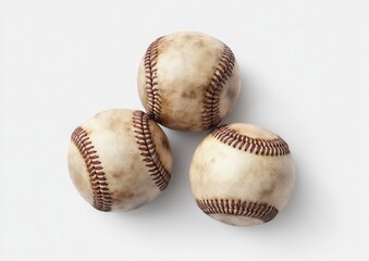 Three vintage baseballs arranged in a loose triangle, set against a plain white background.  The balls show signs of age and wear, with a faded, light brownish-tan color and visible stitching