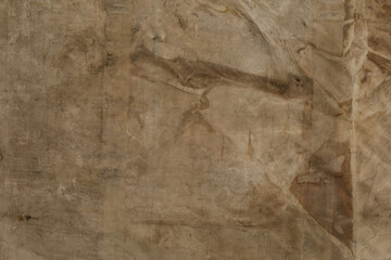 High-resolution image of a brown grunge texture background. Perfect for design projects needing a vintage, aged, or rustic feel.